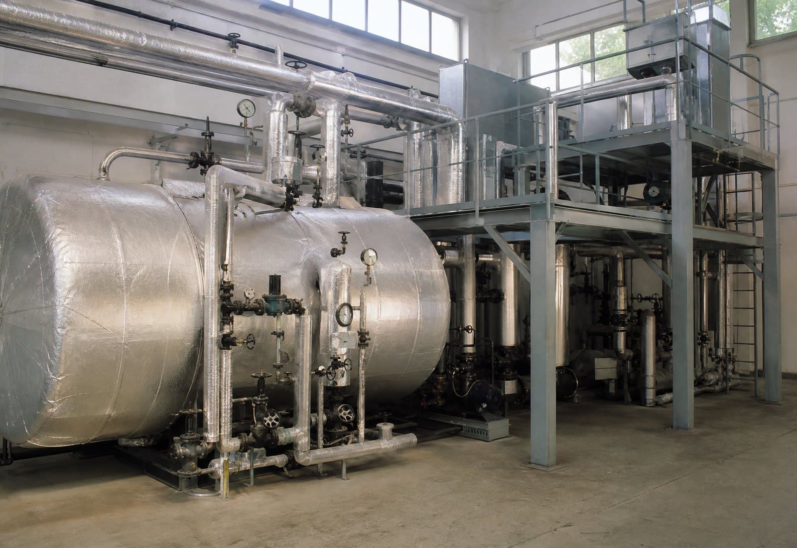 A boiler and heat recovery plant room