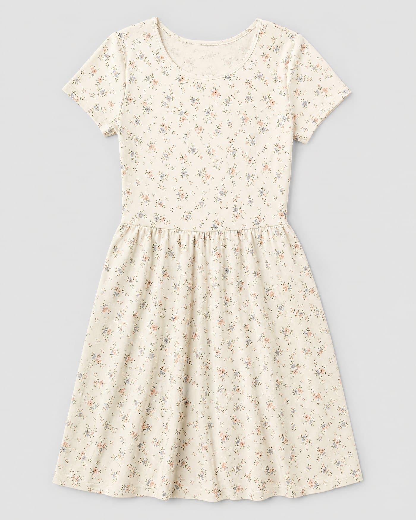 A printed knitted cotton jersey dress in cream