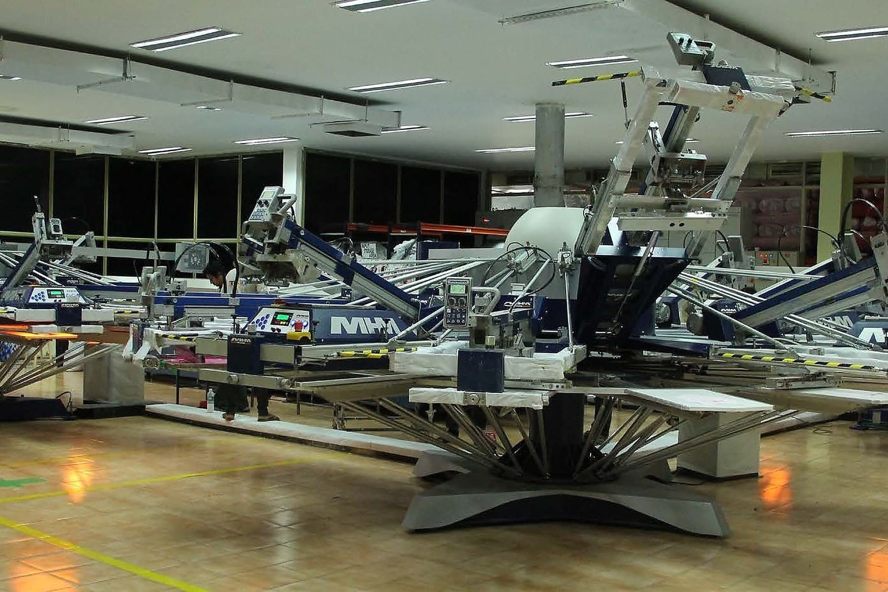 A screen printing carousel on the print floor
