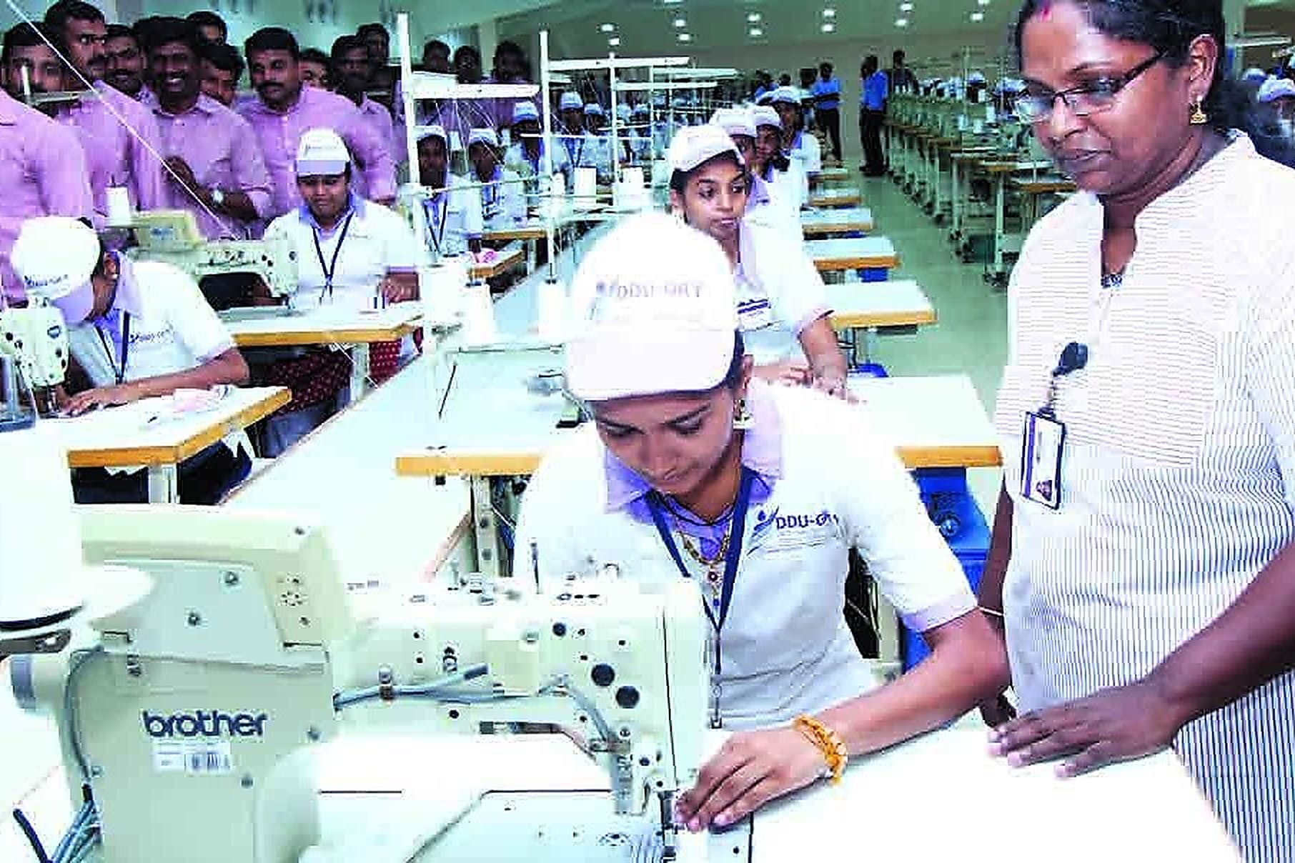 Operators on a sewing line assembling garments